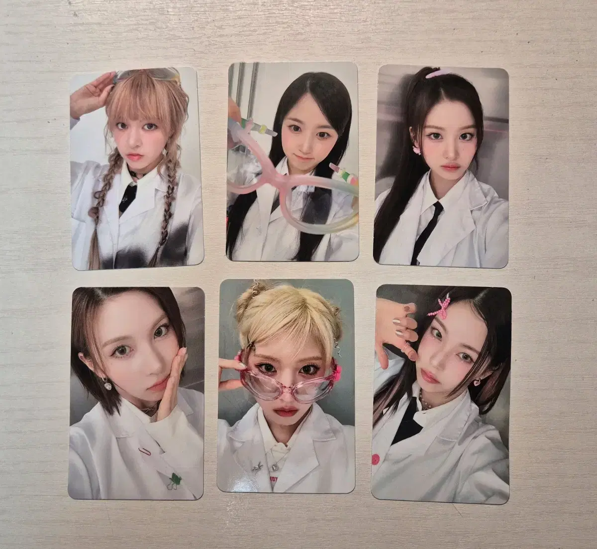 NMIXX fan con I'm selling the Day 2 photo card bulk for the Enthusiast Zone.