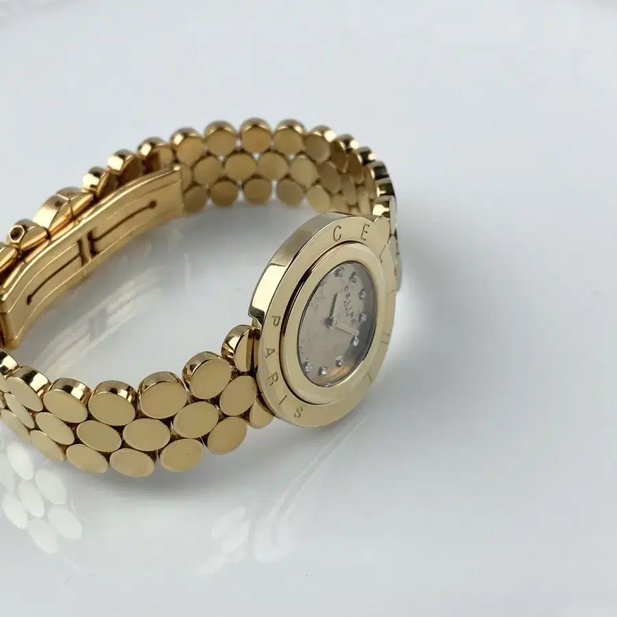 CELINE spangle gold watch