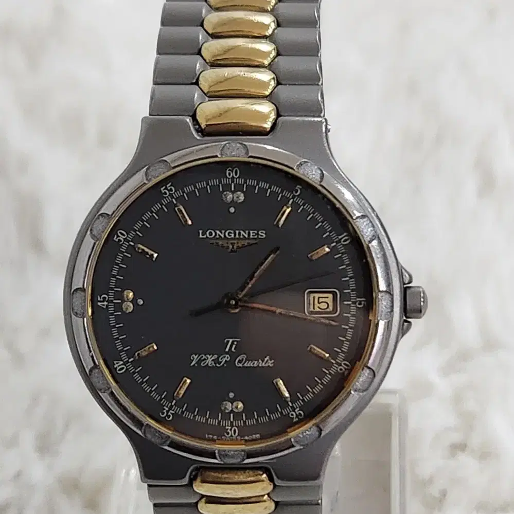 # 20 )  LONGINES  Conquest  VHP  TITAN