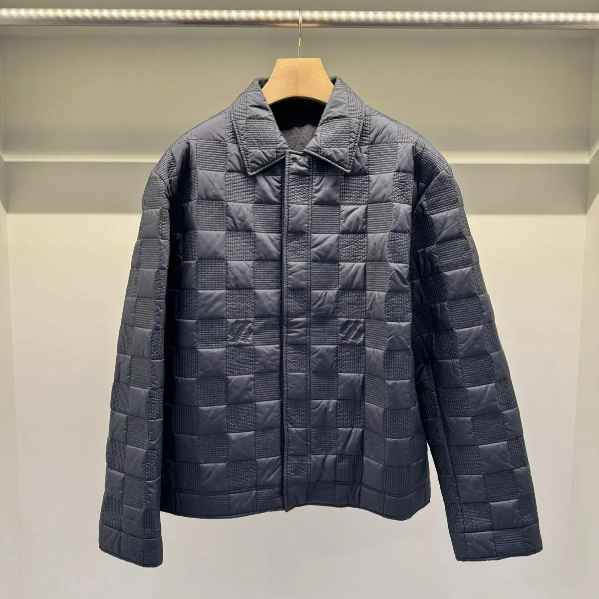 Unused Louis Vuitton Damier logo padded jacket