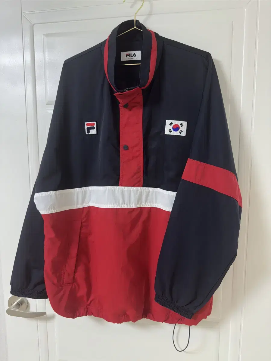 FILA Wheela National Flag Blocking Anorak Half Zip Up Woven Pullover