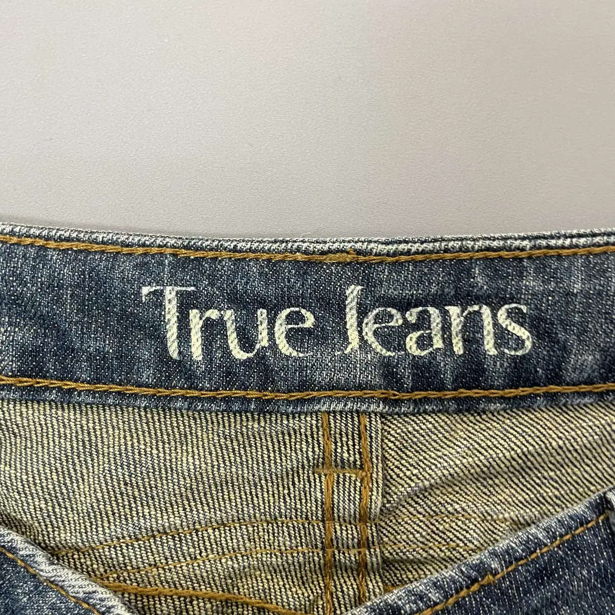 (32) True Jeans 리본버튼 큐빅 워싱 세미부츠컷 데님 팬츠