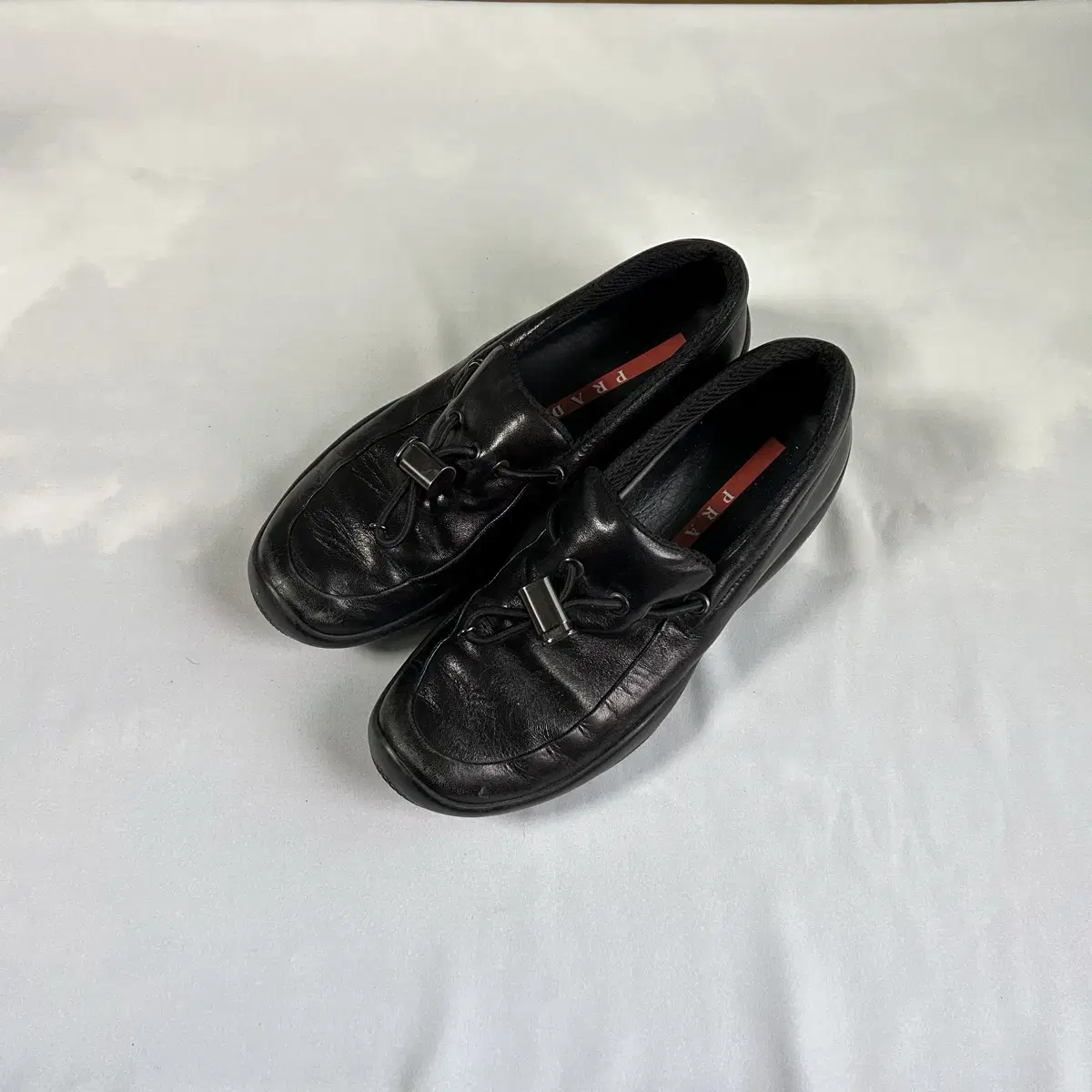 Prada nappa toggle slipon loafers