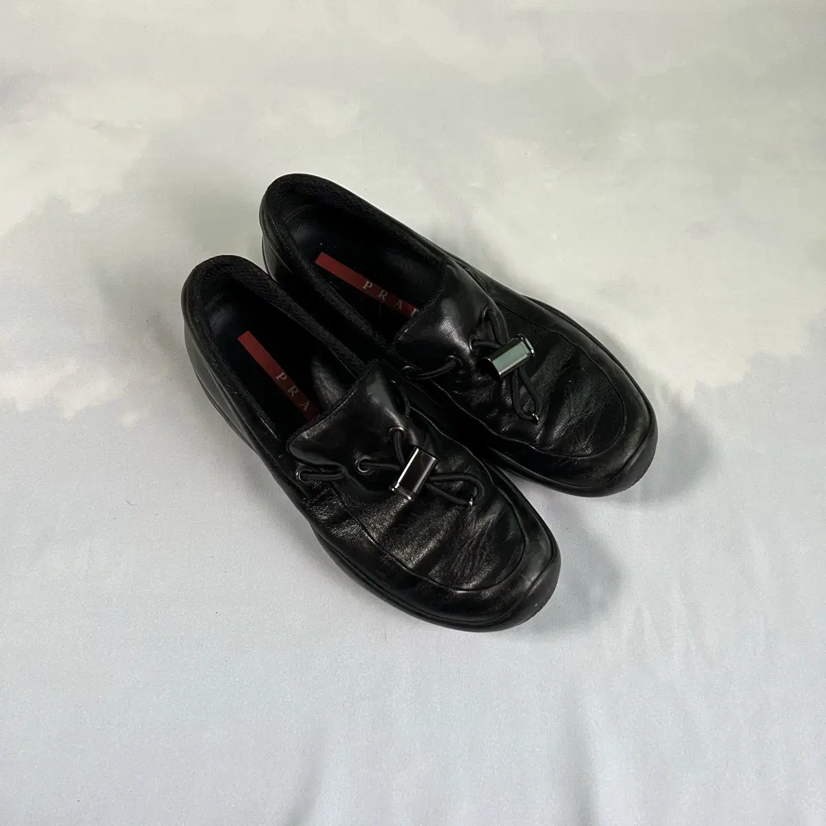 Prada nappa toggle slipon loafers