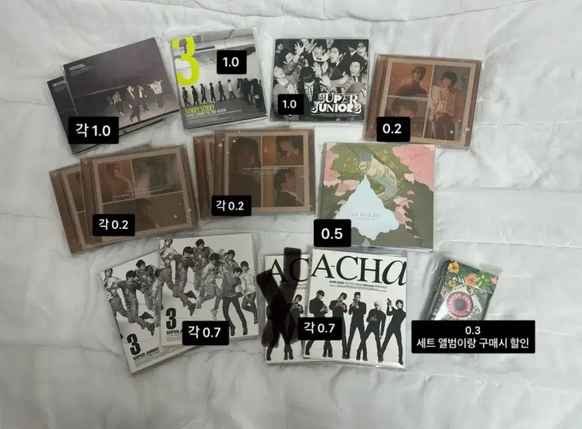 Super Junior albums, dvds sold individually (can also be sold in bulk)