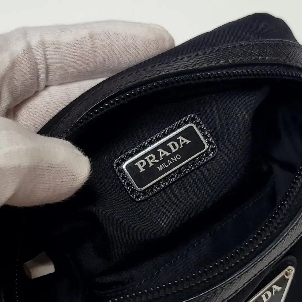 [정품] 프라다 PRADA 리나일론 사피아노 파우치