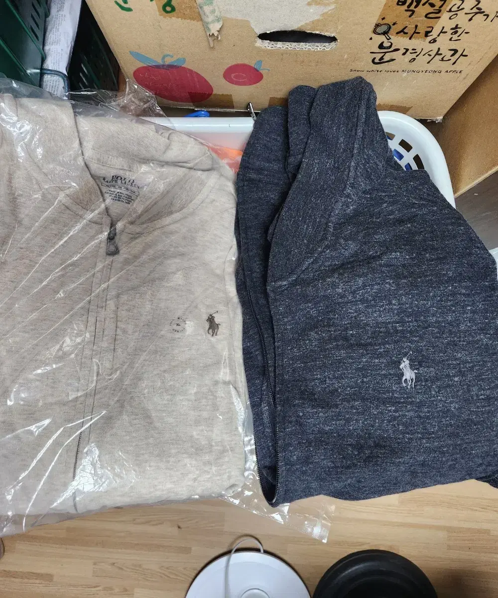 Two Polo Ralph Lauren baseball jackets for sale.