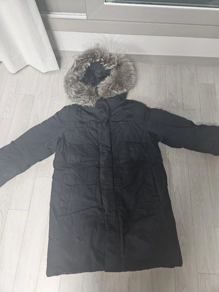 Jia sells coat padding.