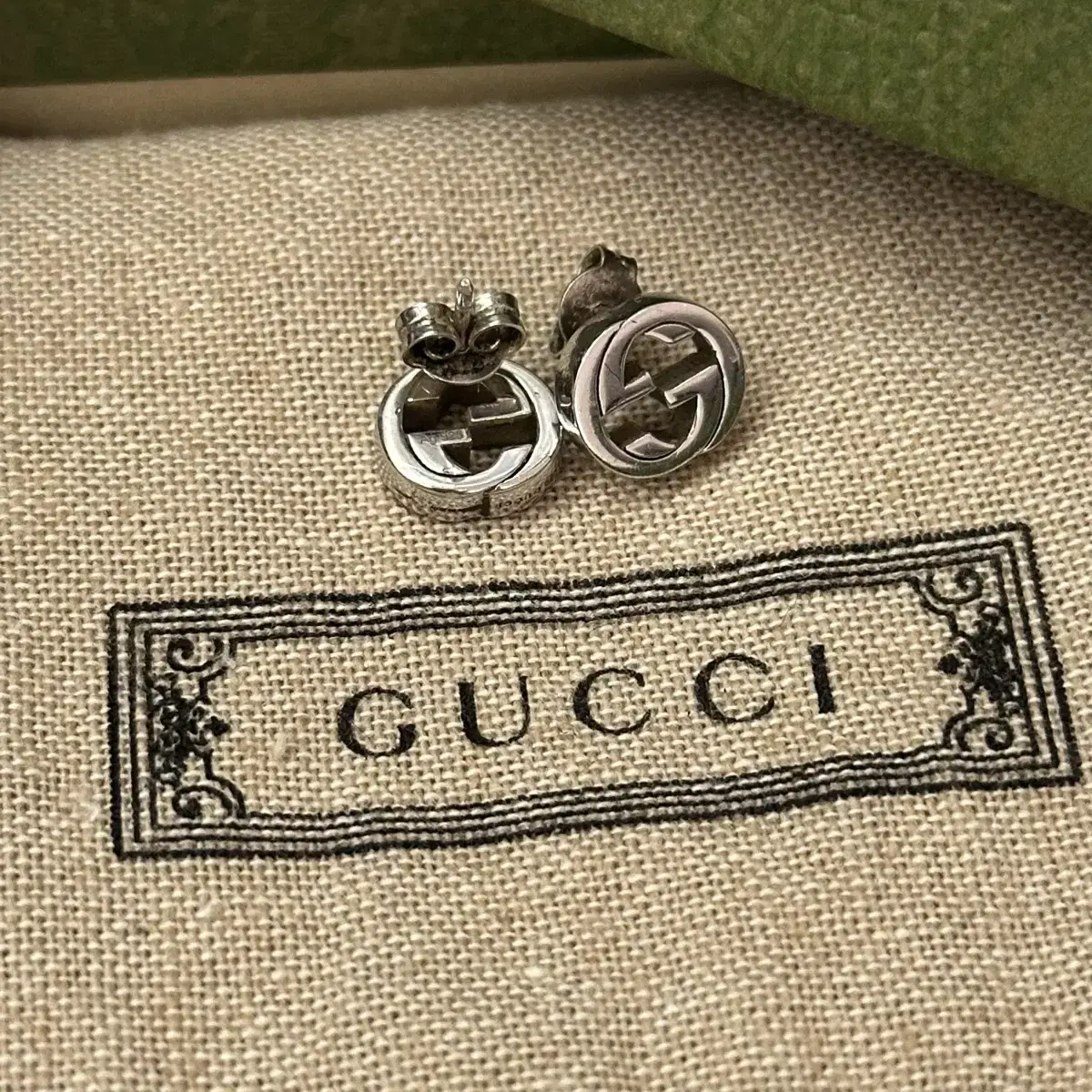 [정품] 구찌 인터로킹 실버 귀걸이 gucci