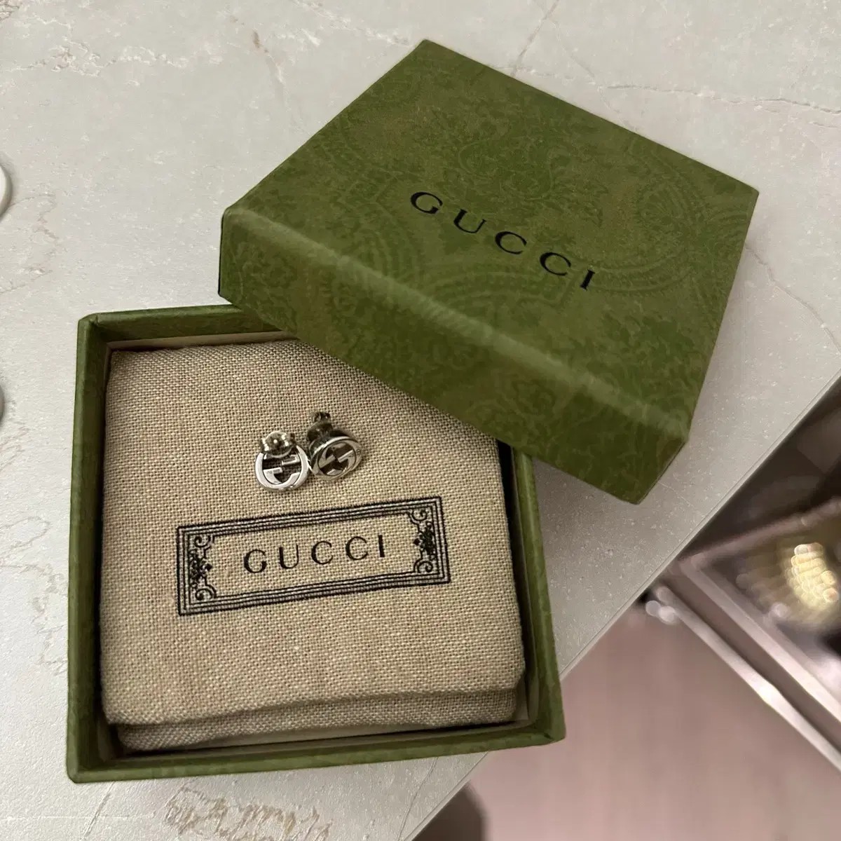 [정품] 구찌 인터로킹 실버 귀걸이 gucci