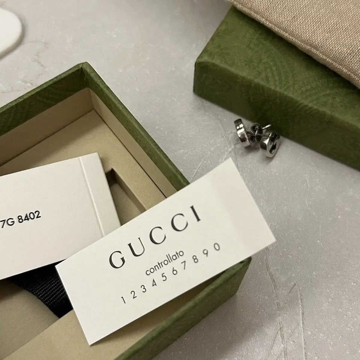 [정품] 구찌 인터로킹 실버 귀걸이 gucci