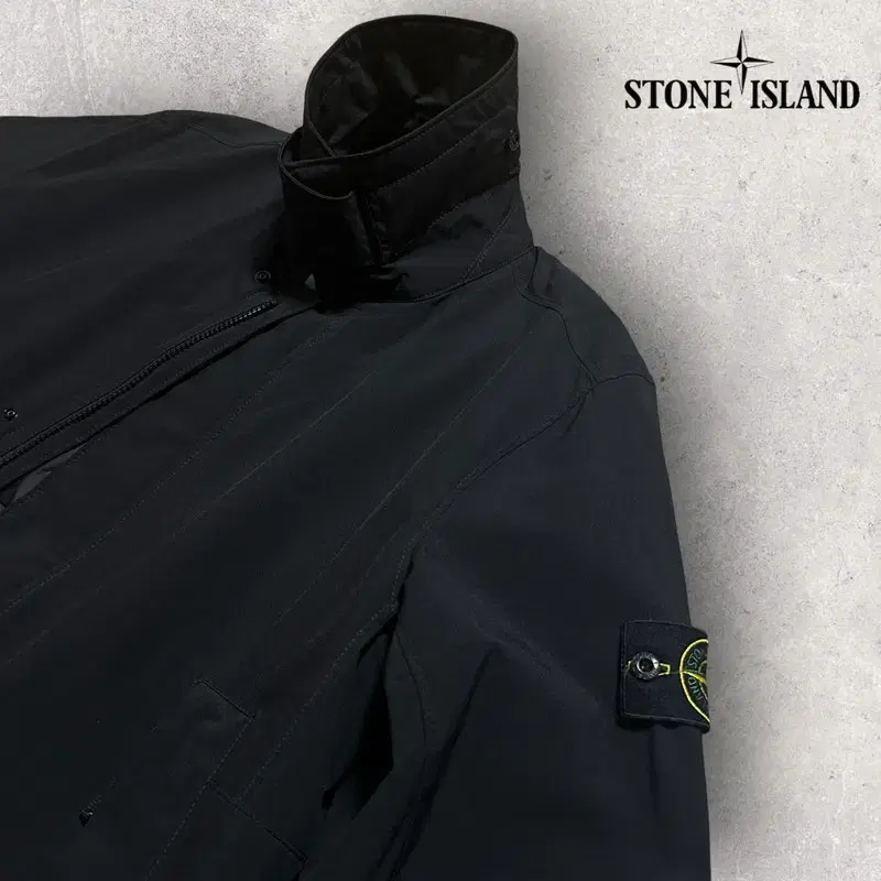 L STONE ISLAND 스톤 소프트쉘 프리마로프트 코트