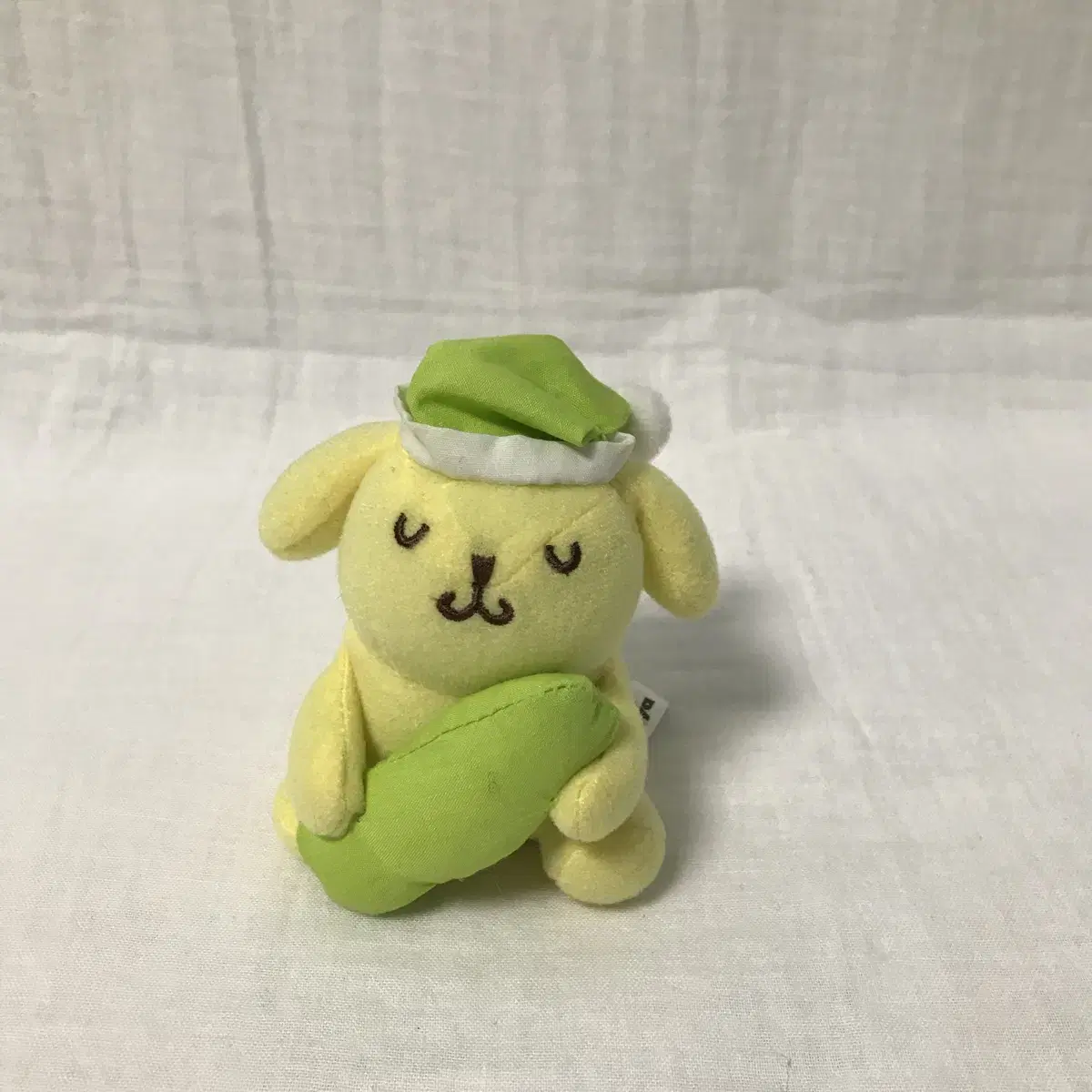 Pompompurin doll in classic pajamas from 2000.