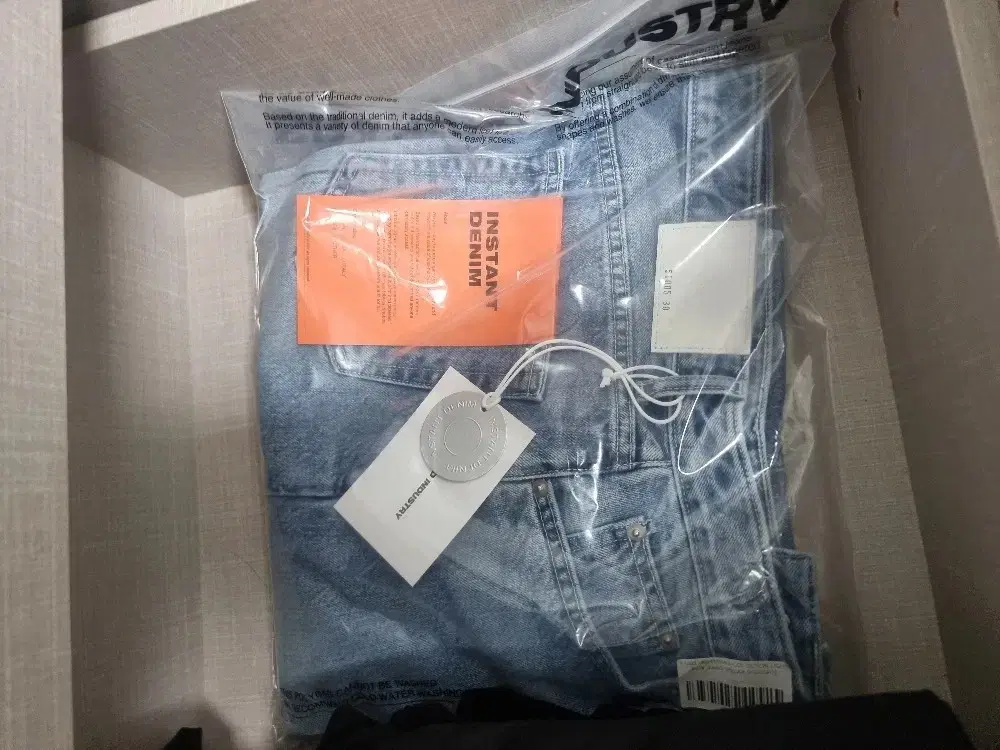 Branded denim pants (light blue jeans), new and unworn.