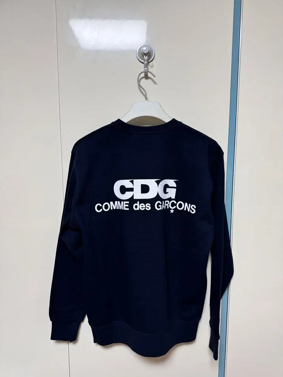 Comme des Garçons Song CDG Man to Man for sale.