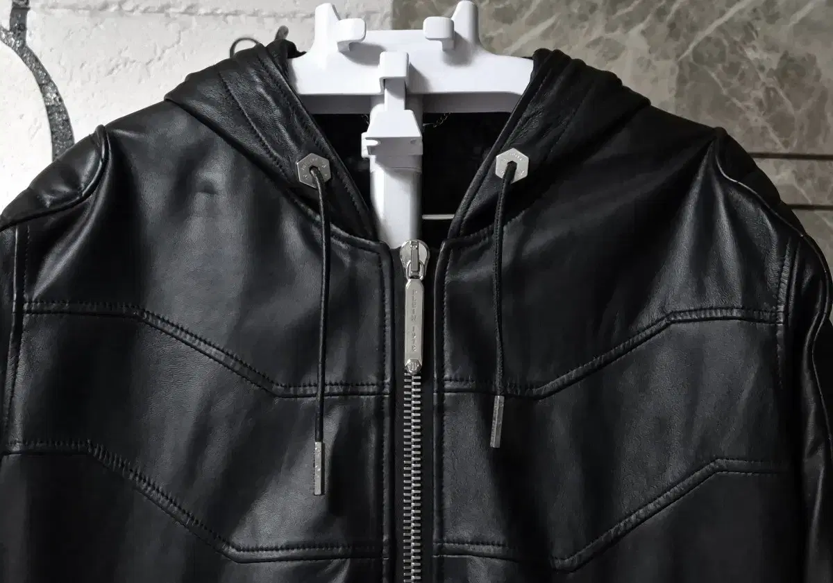 I am selling a genuine Phillip Plein leather hooded jacket