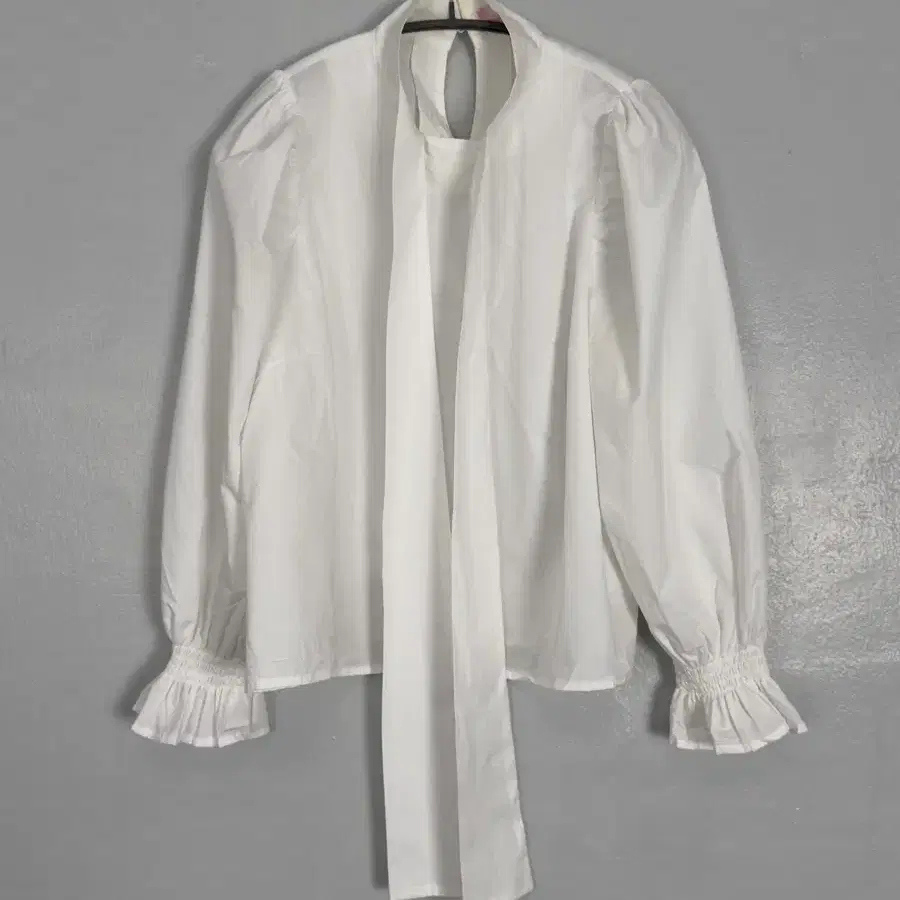 vintage white ruffle tie-neck blouse