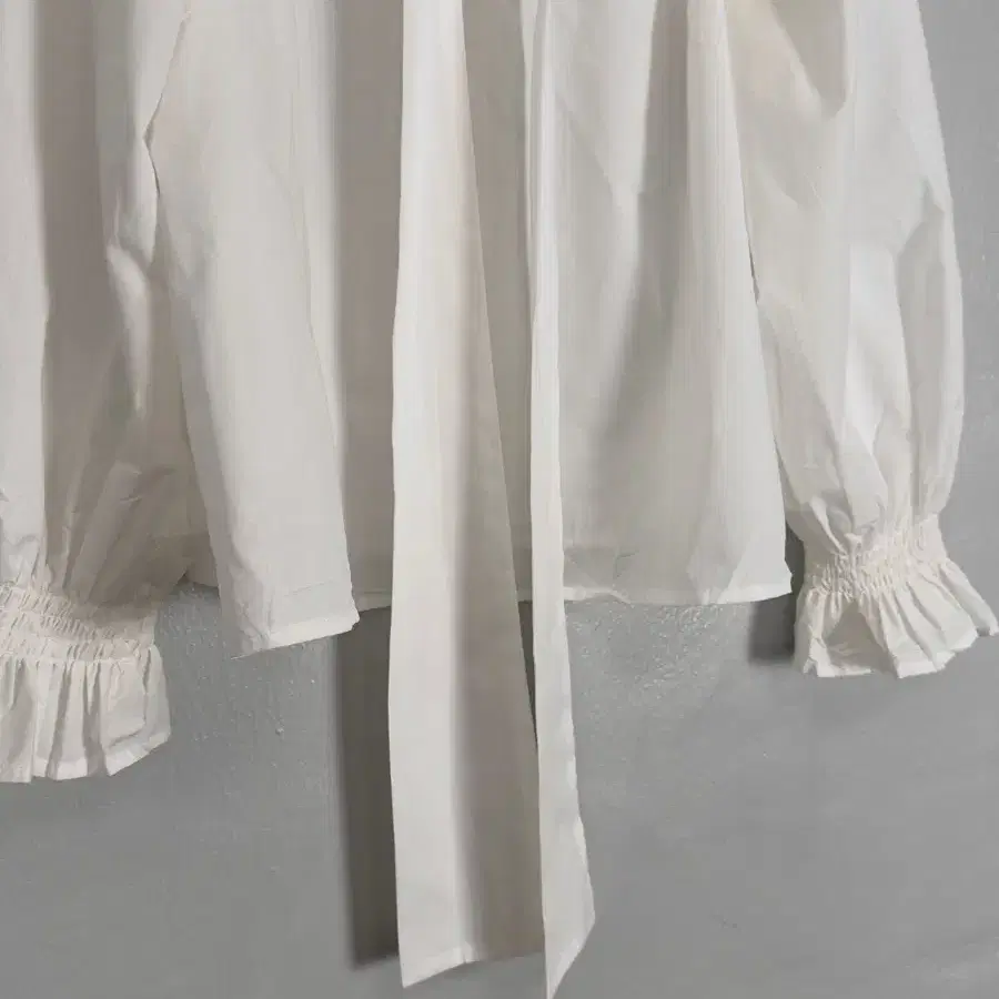 vintage white ruffle tie-neck blouse