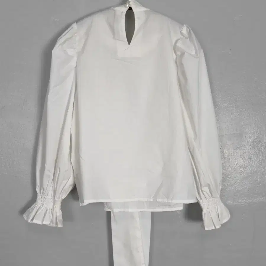 vintage white ruffle tie-neck blouse