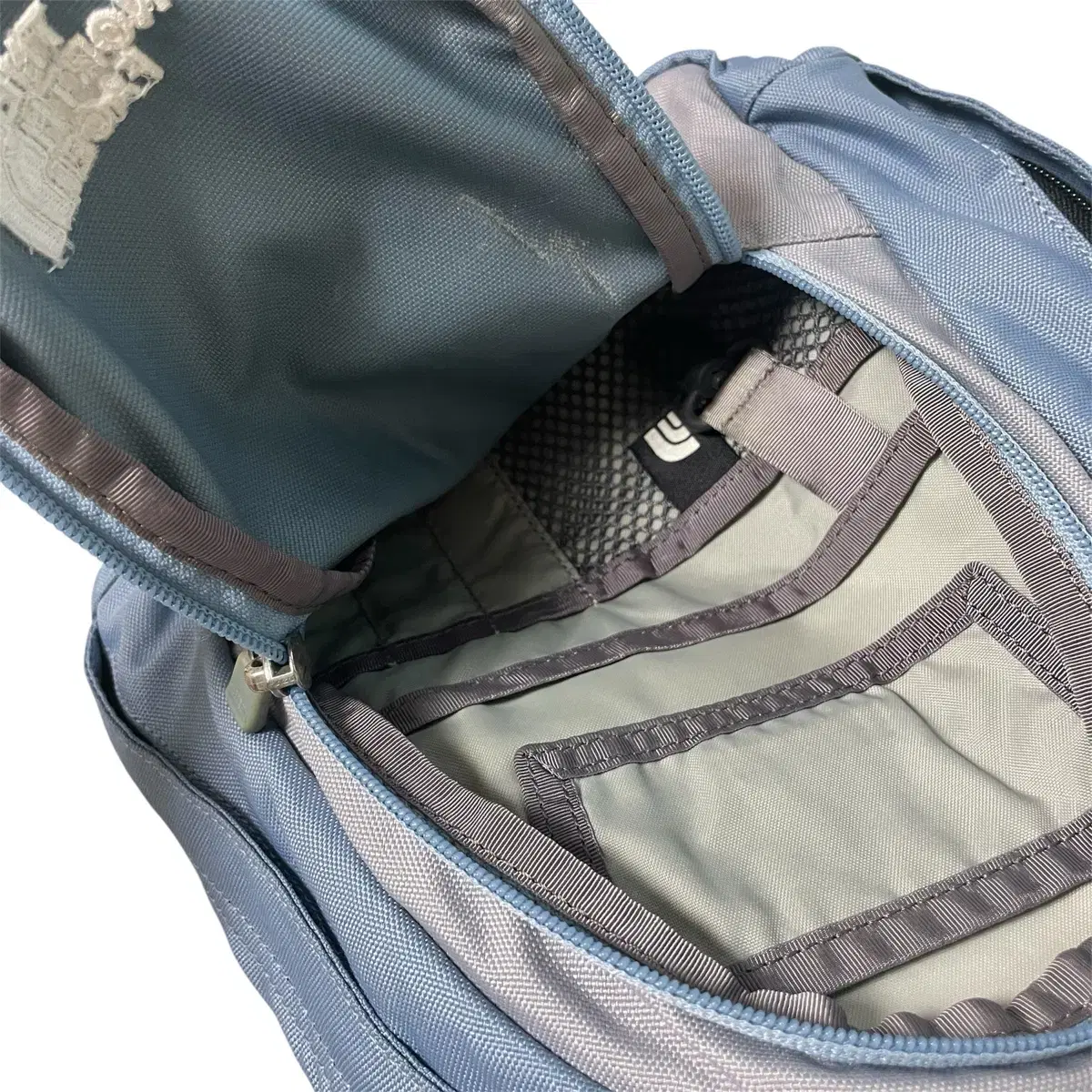 The north face sky blue mini backpack