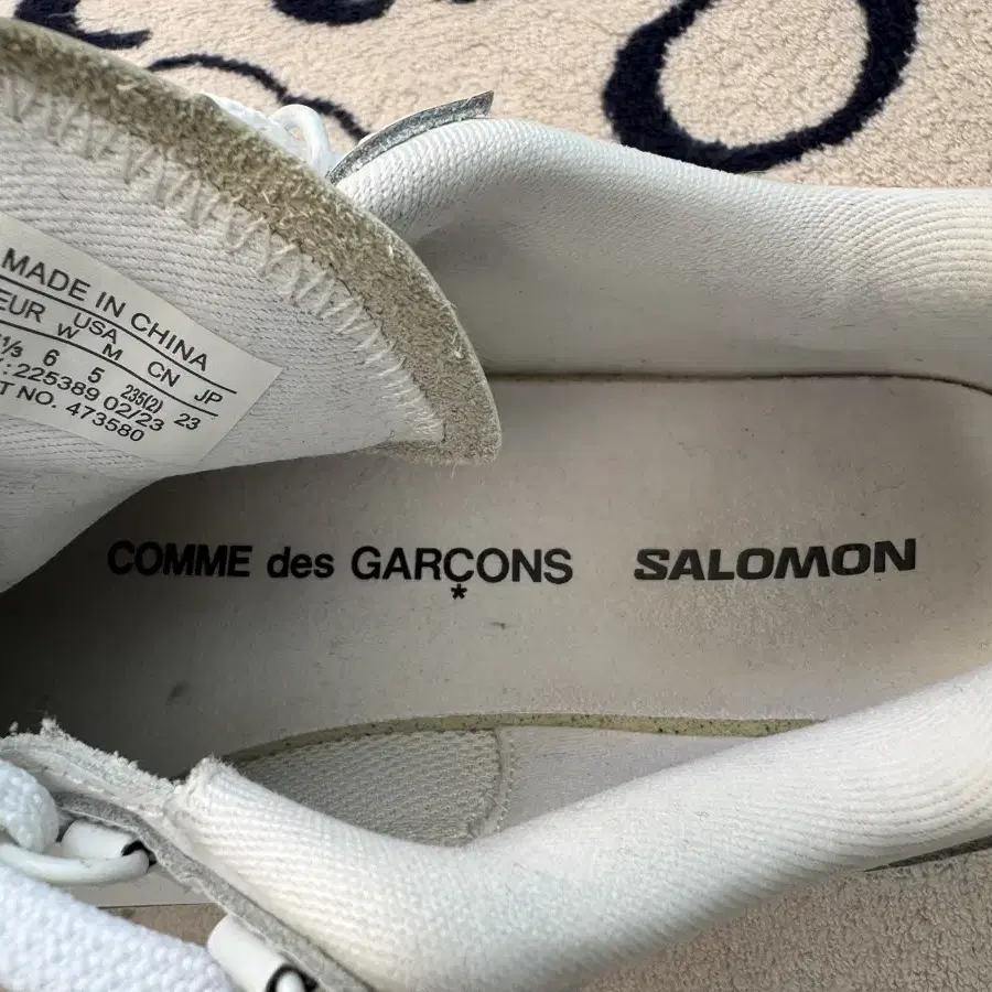 살로몬 x 꼼데가르송 옴므 SR811 레더 플랫폼 화이트 SALOMON