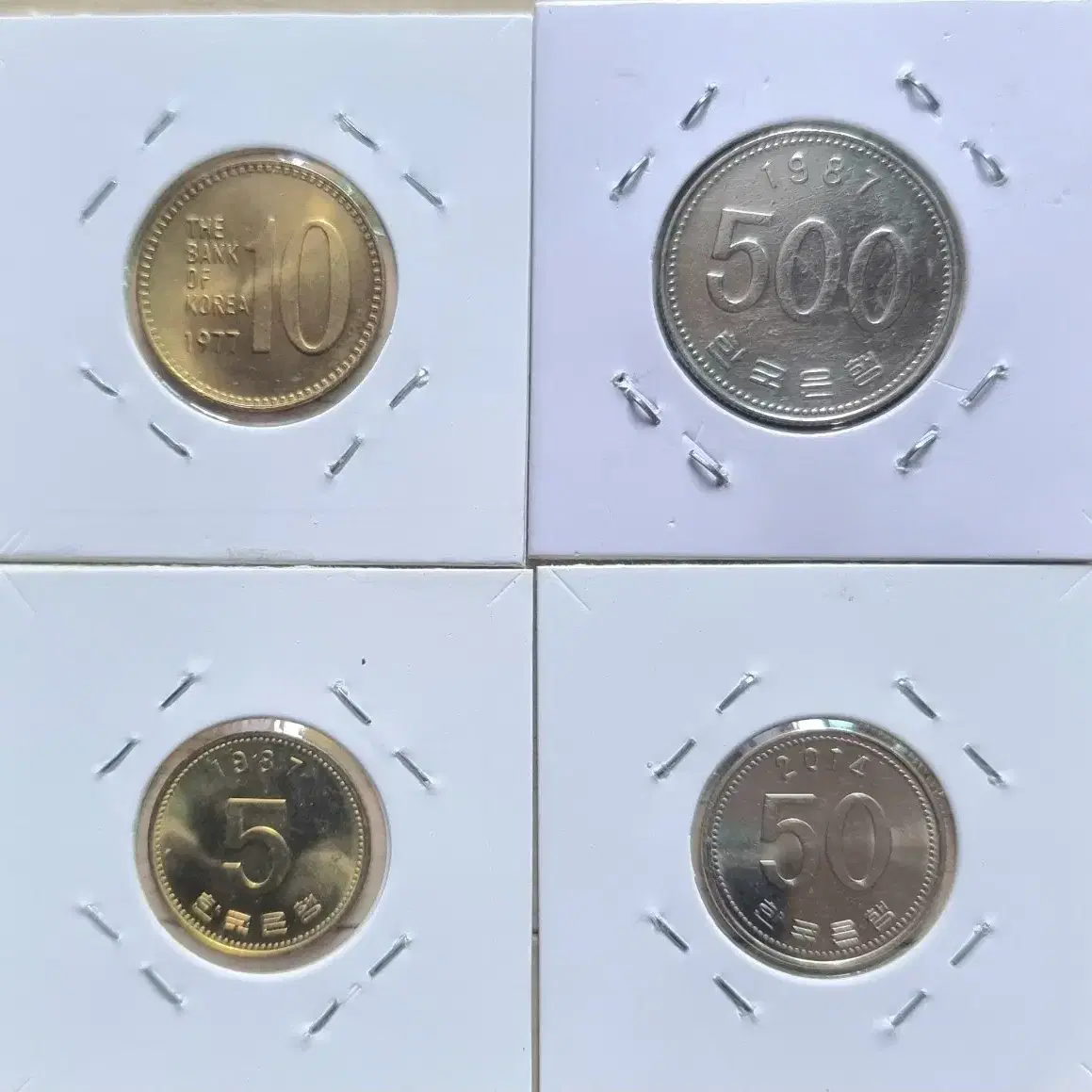 87년500원  87년5원  77년10원 2014년50원 동전을판매합니다