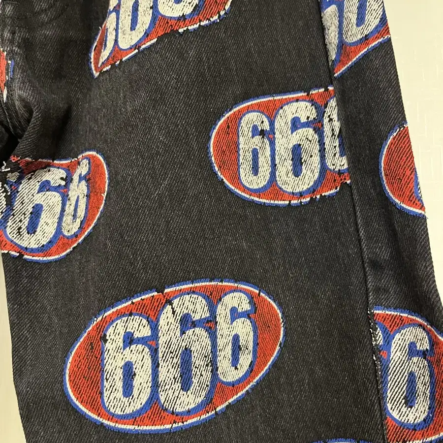 Supreme 666 denim pants