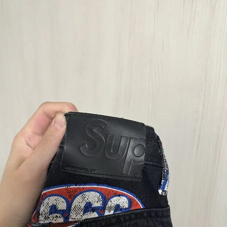 Supreme 666 denim pants