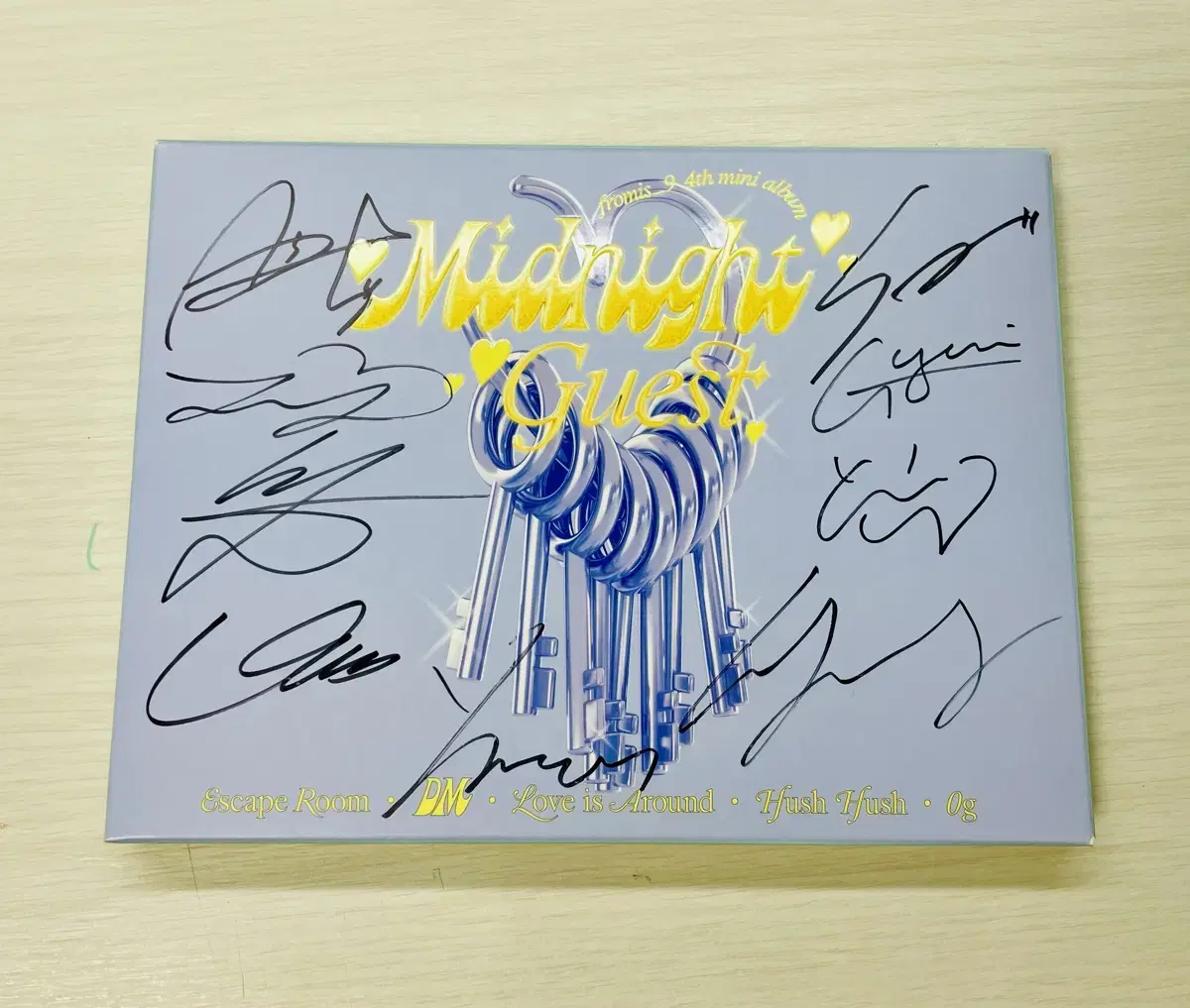 Album signed by all members of Fromis 9