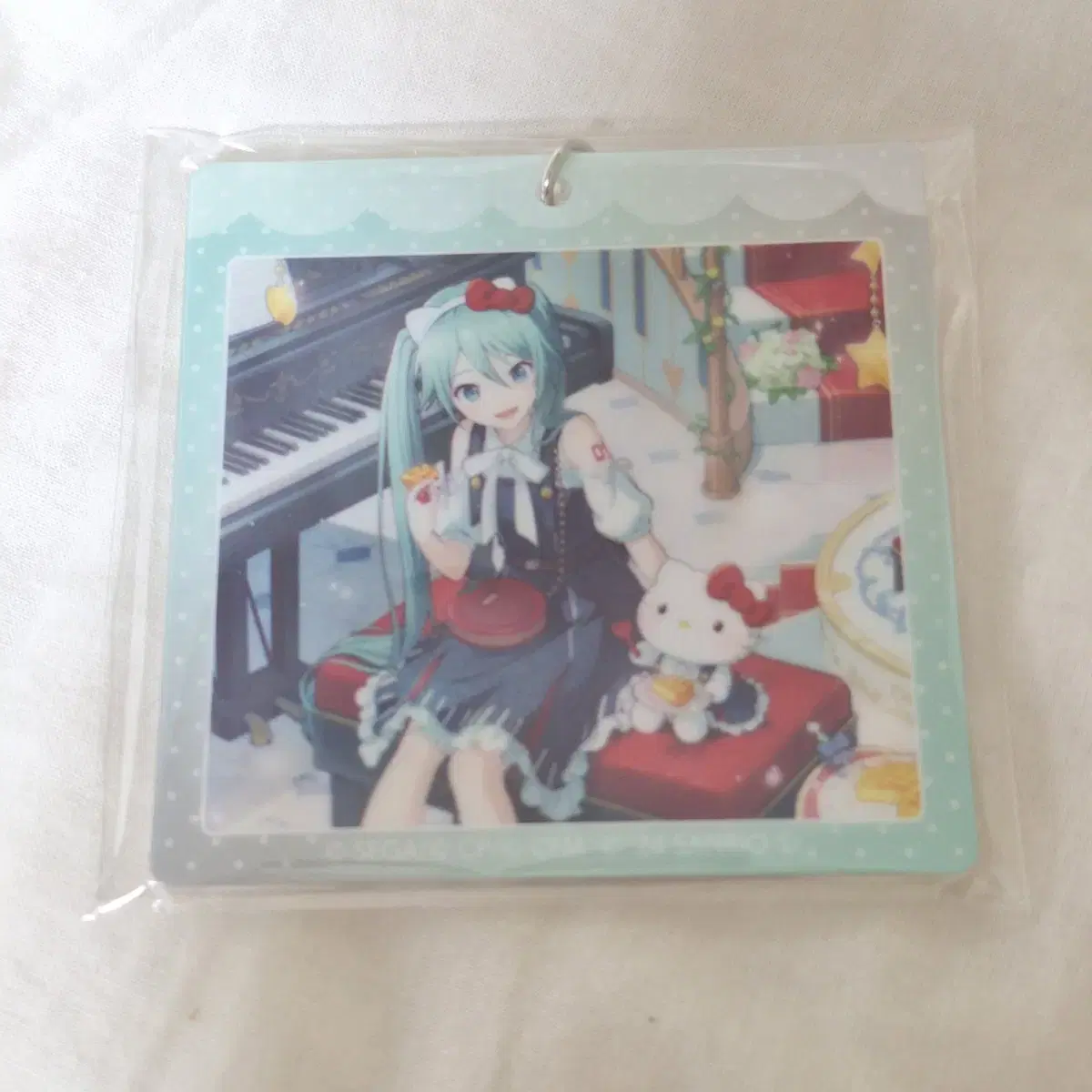 [ration] Pseudo Sanrio Miku acrylic keyring