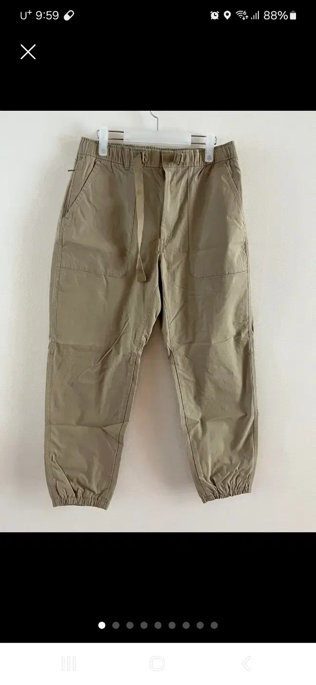 2 pairs of Uniqlo men's jogger pants (beige, black)