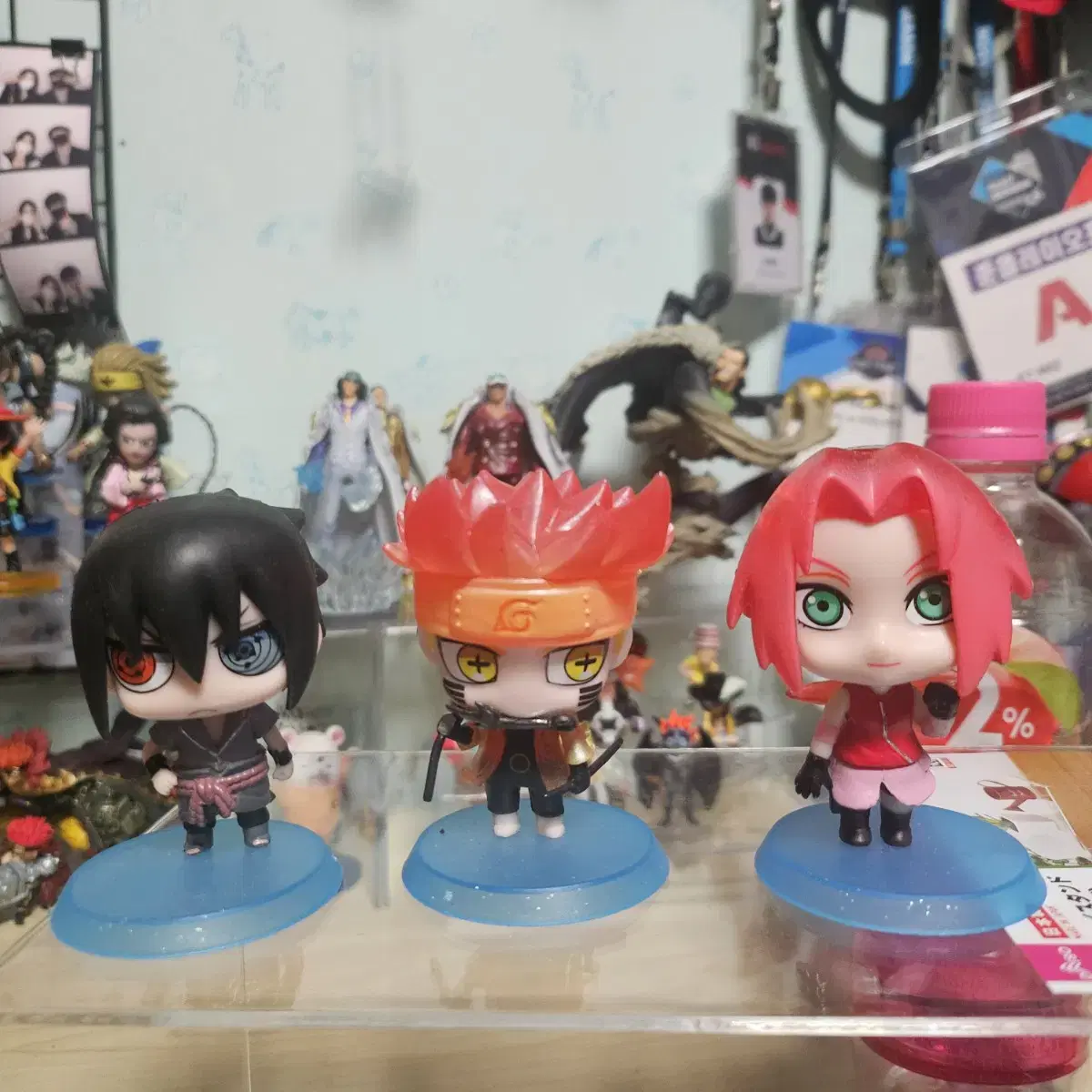 Sells Naruto merchandise figures in bulk (Naruto, Sasuke, Sakura)