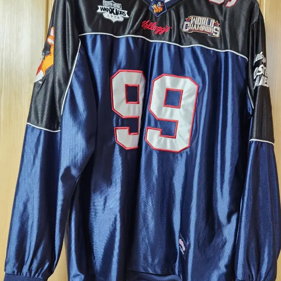 KELLOGGS FOOTBALL JERSEY (NAVY) 위캔더스 켈로그