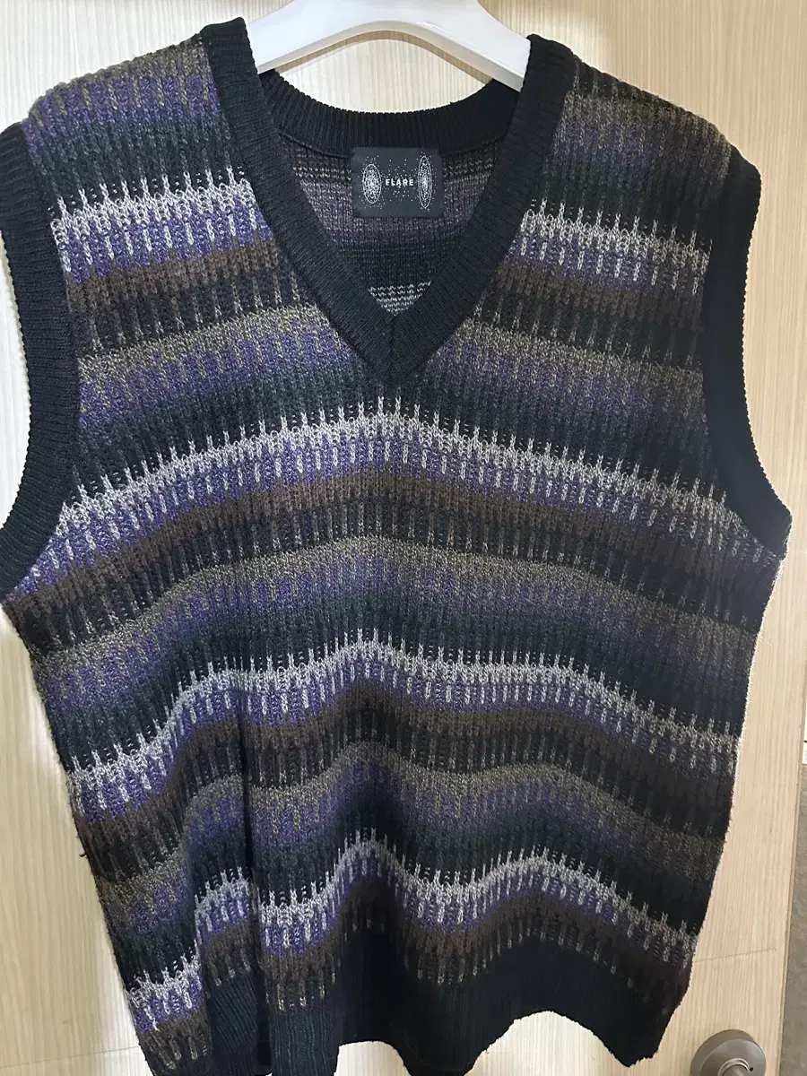 Flare-up knit vest sells