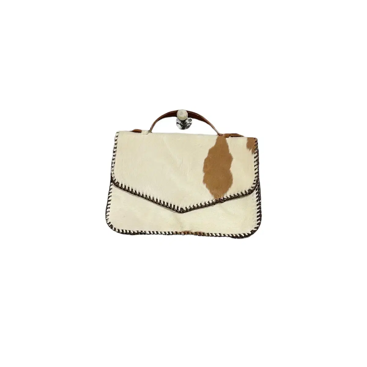 Cow pattern ivory handbag