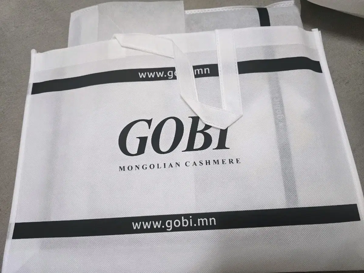 (새상품) gobi 고비 캐시미어 머플러 브라운 팝니다