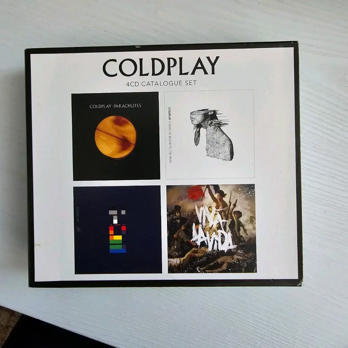 Coldplay 1,2,3,4 album set sold for 35,000 won