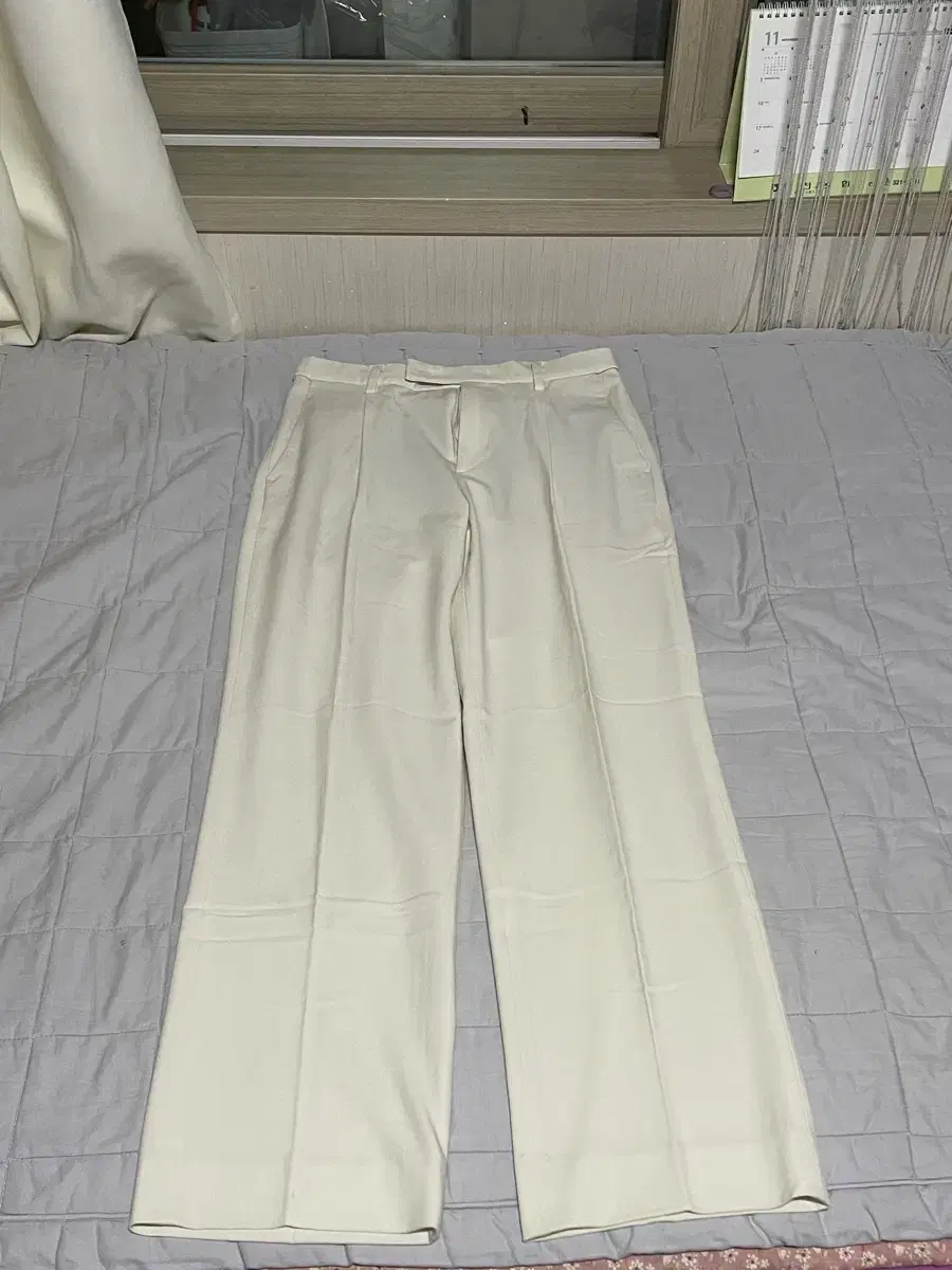 I'm selling a pair of mens standard slacks.