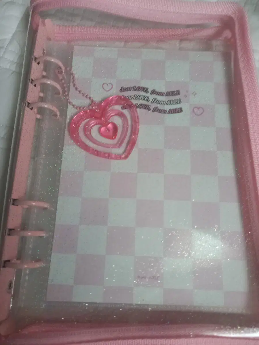 Promenade Pink Zipper binder sells