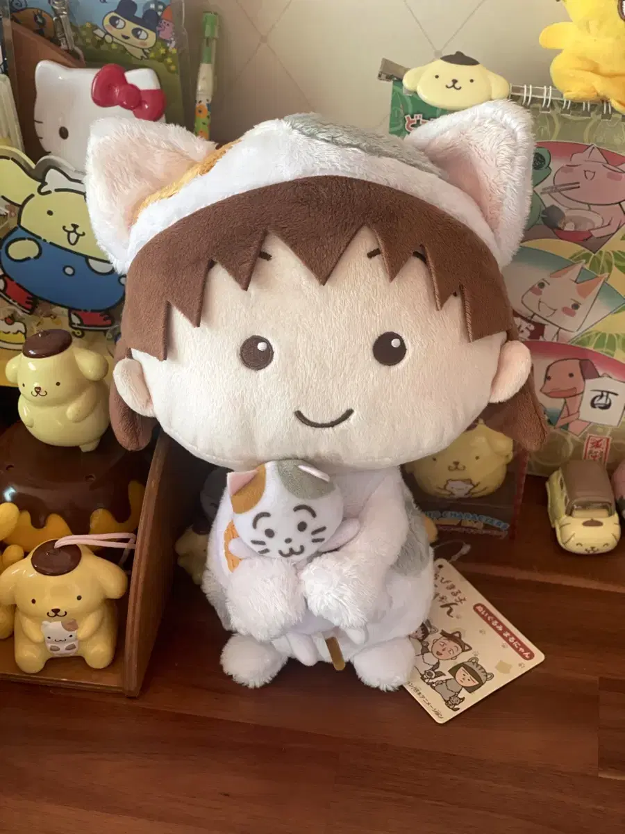 Maruko is a nine-year-old cat doll.