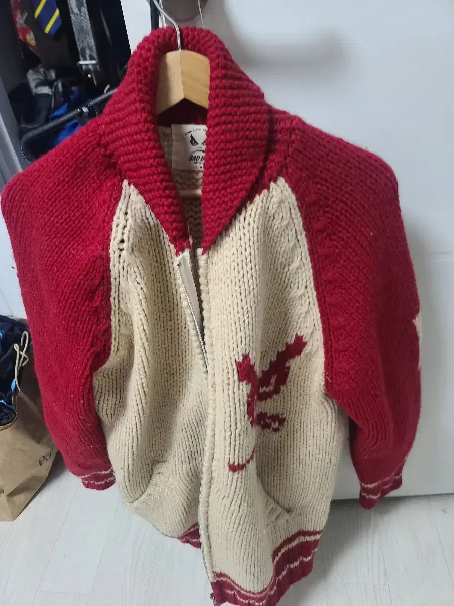 I'm selling 100 bad boy heavyweight wool knit cardigans.