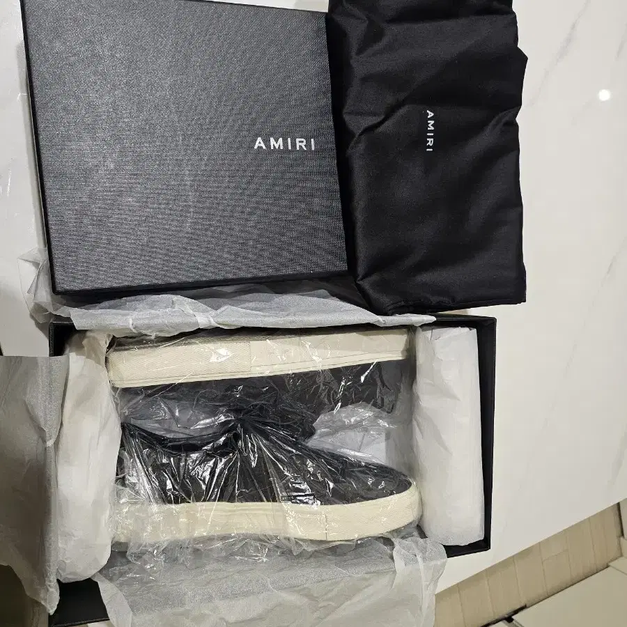 AMIRI 아미리 스켈 토 슬립온