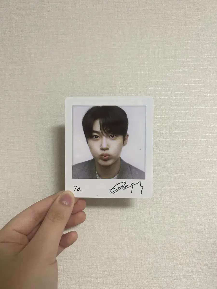 Wooseok Byun's arm is also sold at polaroid 