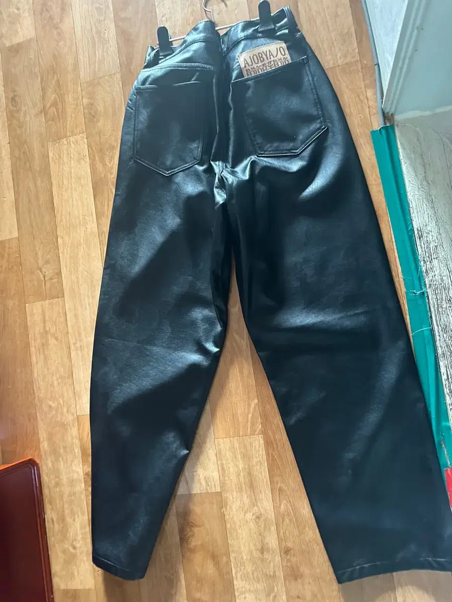 Sells azobaiajo vegan leather pants.