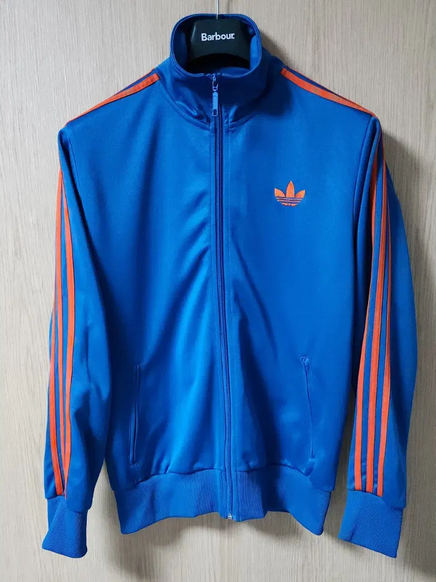 (pictured) Adidas Firebird Jersey Track Top