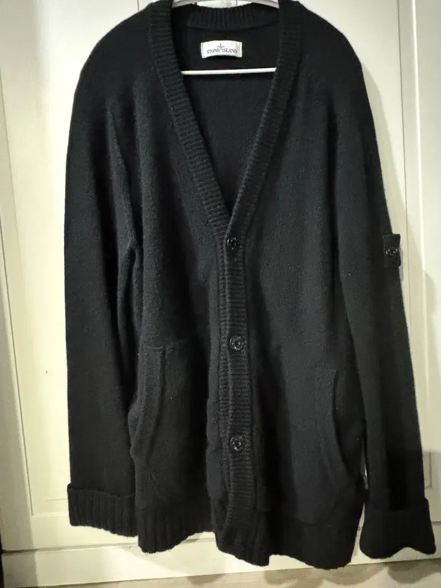 I'm selling my Stone Island cardigan.