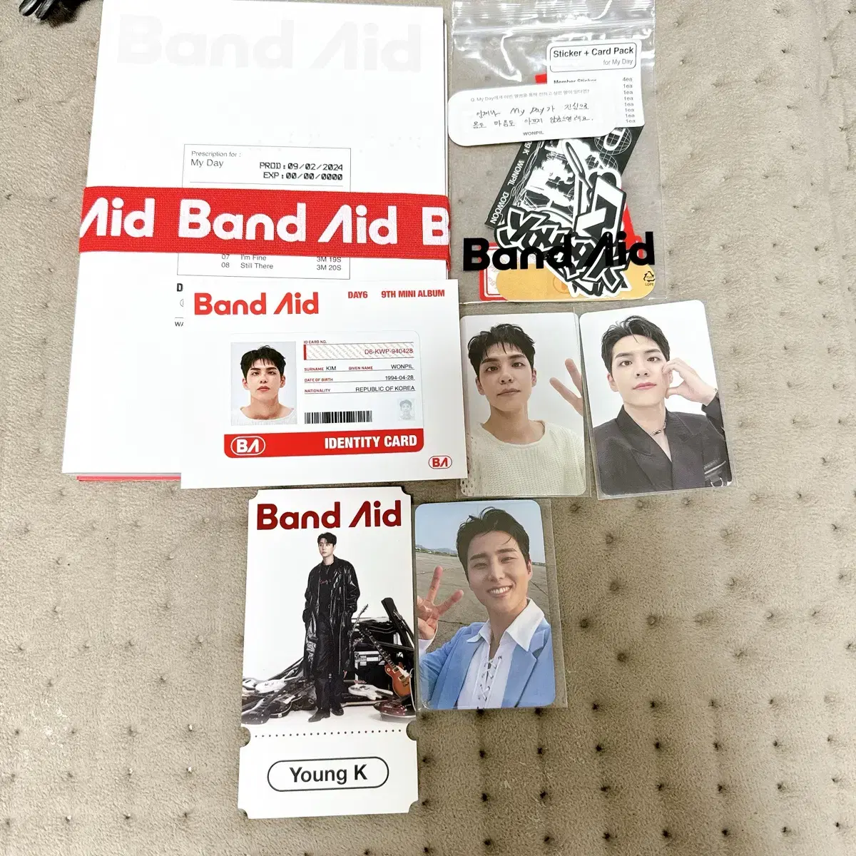 Day 6 One Peel Younghyun Bandaid photocard aladin pre-order benefit including full set sells.