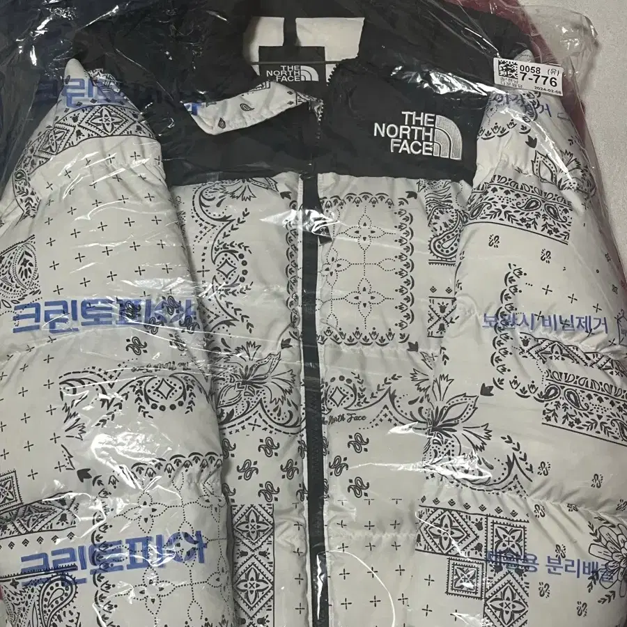 (S) The North Face 1996 눕시자켓 오프화이트