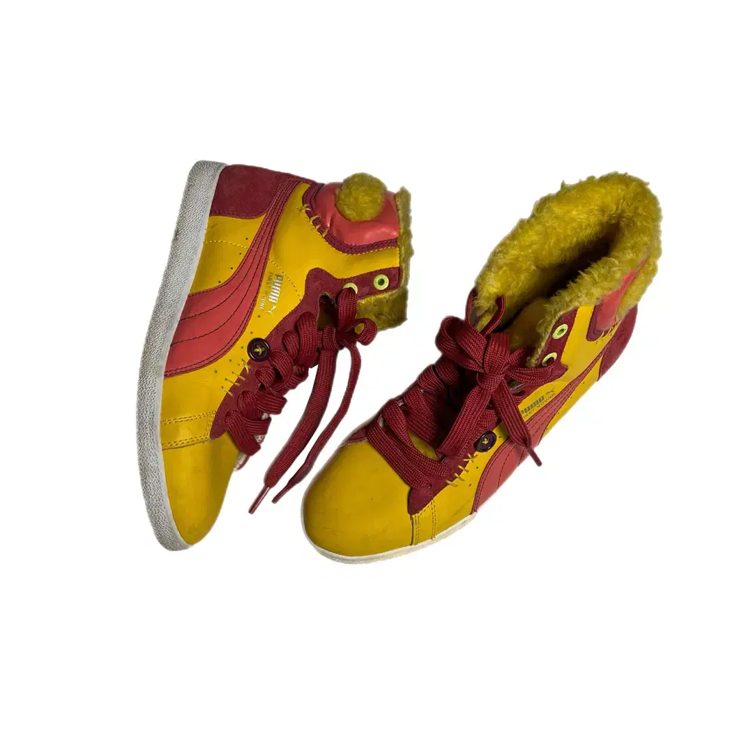 First Round Yellow Puma High Top Puma First Round Leather Sneakers