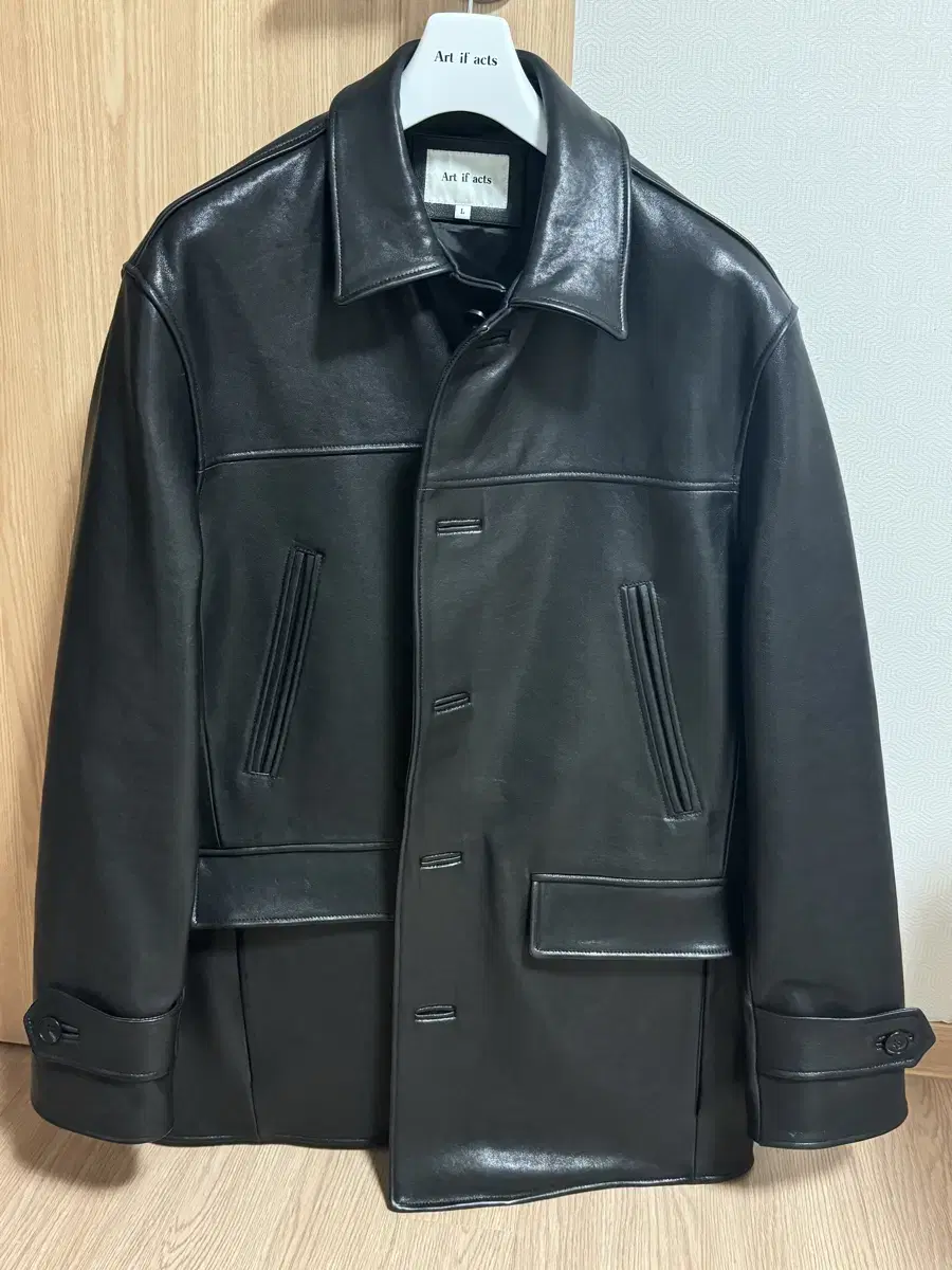 (L) Artifacts Leather Car Coat sells